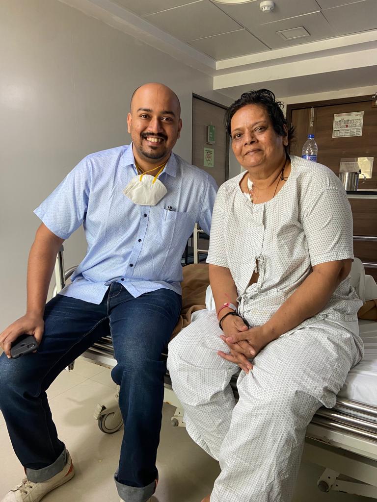 International patient speaking with doctor in hospital